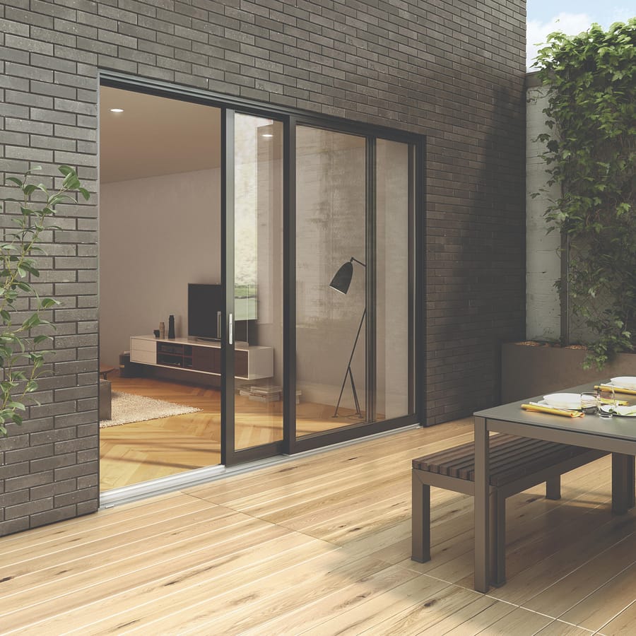 A black framed sliding patio door opening onto a deck